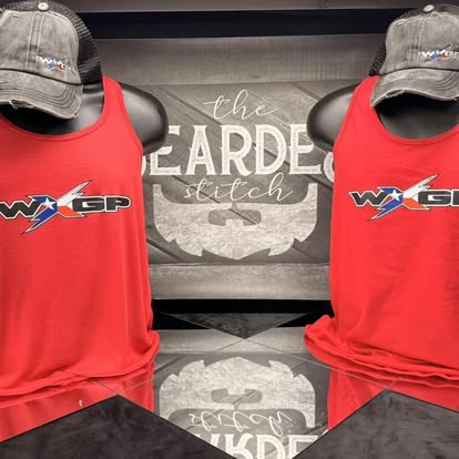 Red WXSP custom shirts and caps displayed together