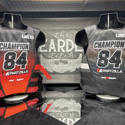 Custom racing jerseys displayed in the Bearded Stitch shop