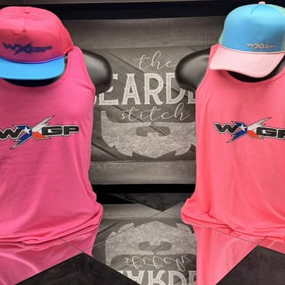 Bright custom WXSP tank tops displayed together