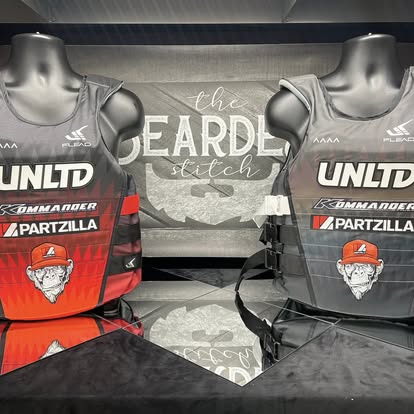 Custom racing tops displayed on mannequins
