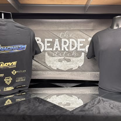 Black custom tee and hat displayed in the Bearded Stitch shop