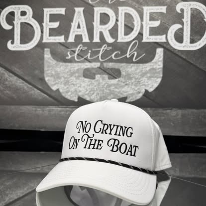 White custom hat with No Crying on the Boat text